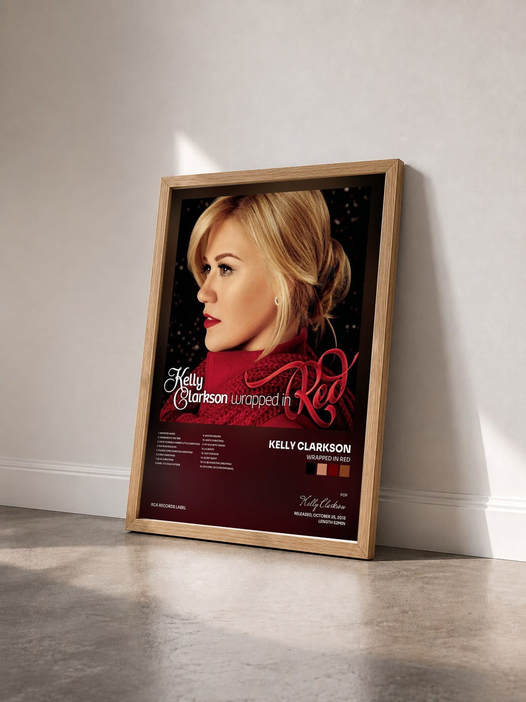 #bois Tableau de l'album Wrapped In Red de Kelly Clarkson vu de trois quarts, cadre en bois brut