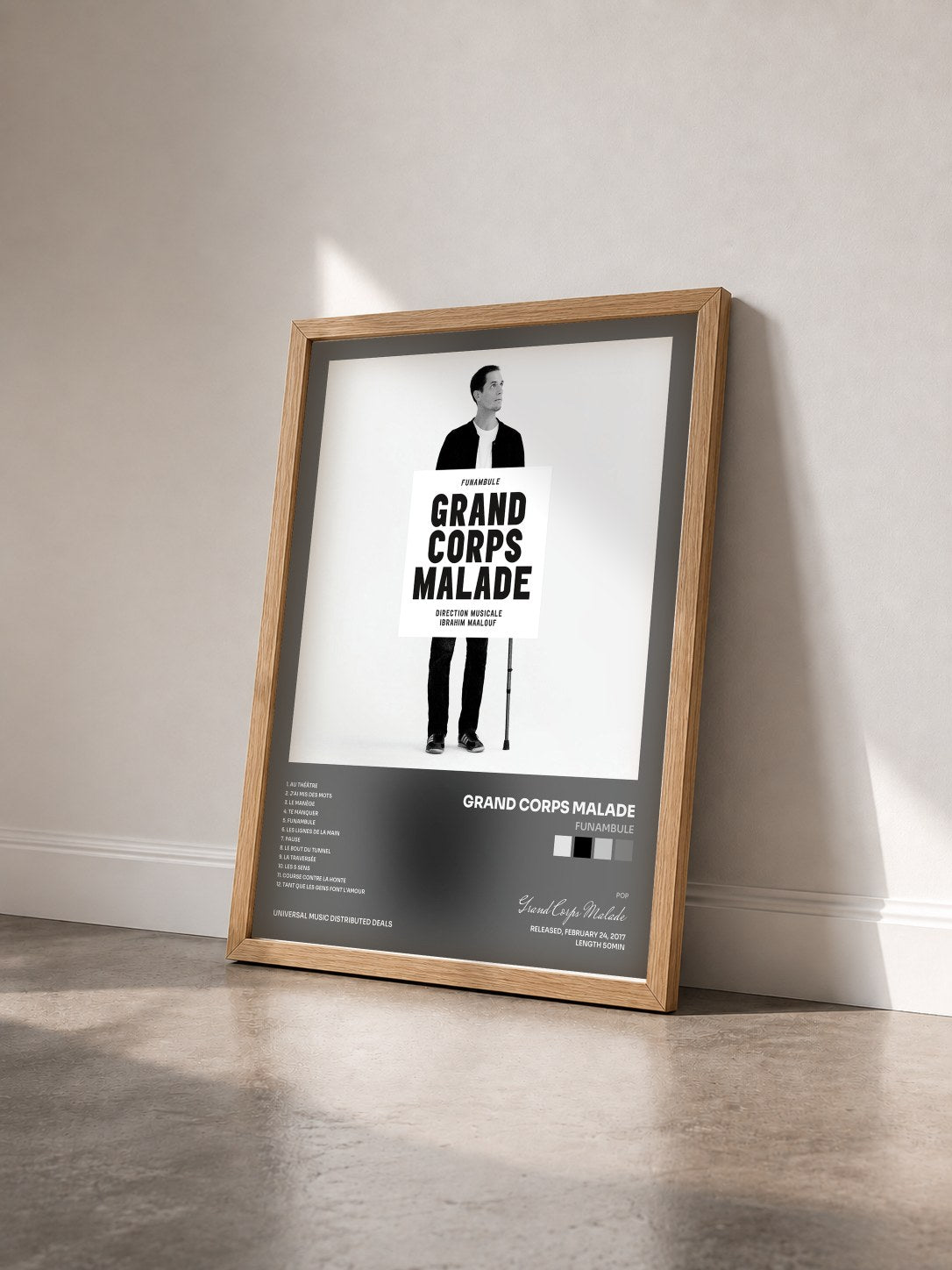 #bois Tableau de l'album Funambule de Grand Corps Malade vu de trois quarts, cadre en bois brut