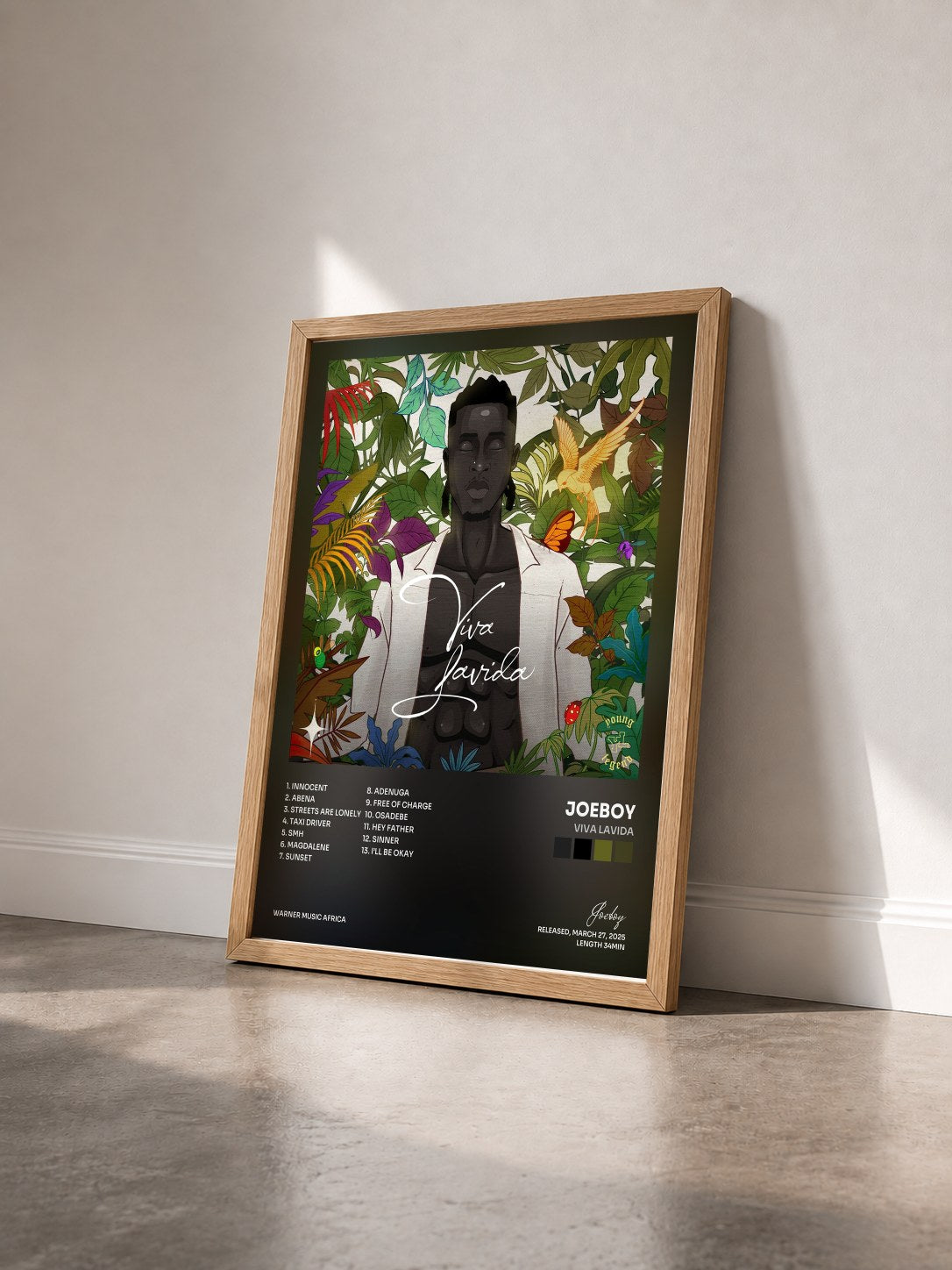 #bois Tableau de l'album Viva Lavida de Joeboy vu de trois quarts, cadre en bois brut