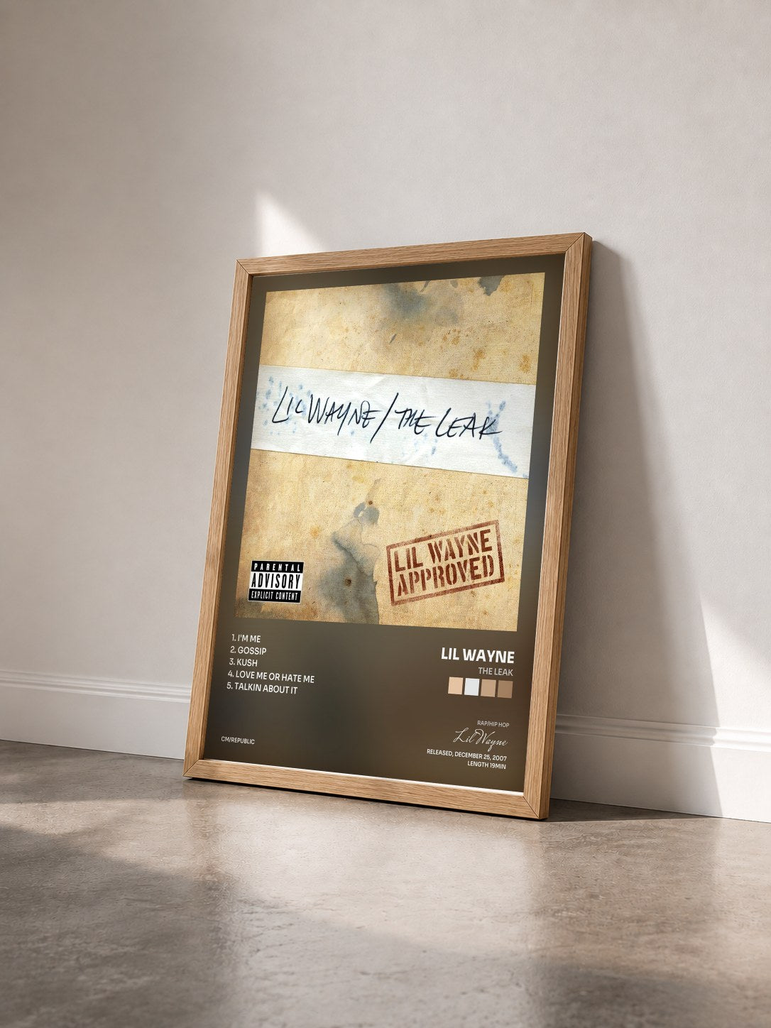 #bois Tableau de l'album The Leak de Lil Wayne vu de trois quarts, cadre en bois brut