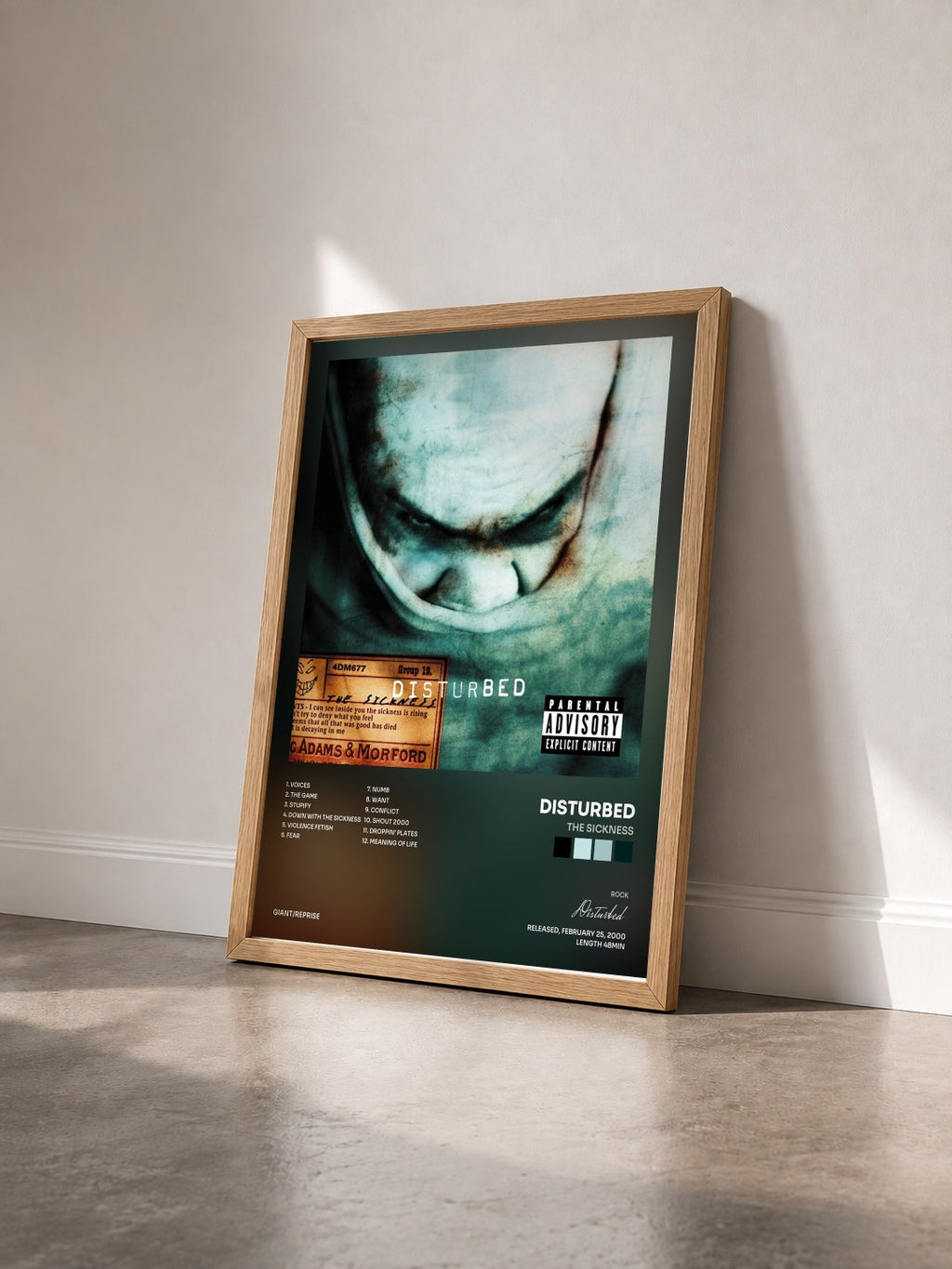 #bois Tableau de l'album The Sickness de Disturbed vu de trois quarts, cadre en bois brut