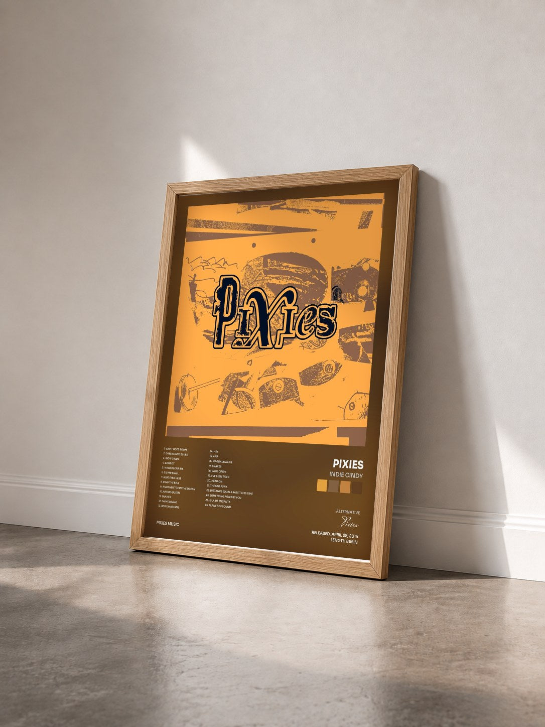 #bois Tableau de l'album Indie Cindy de Pixies vu de trois quarts, cadre en bois brut