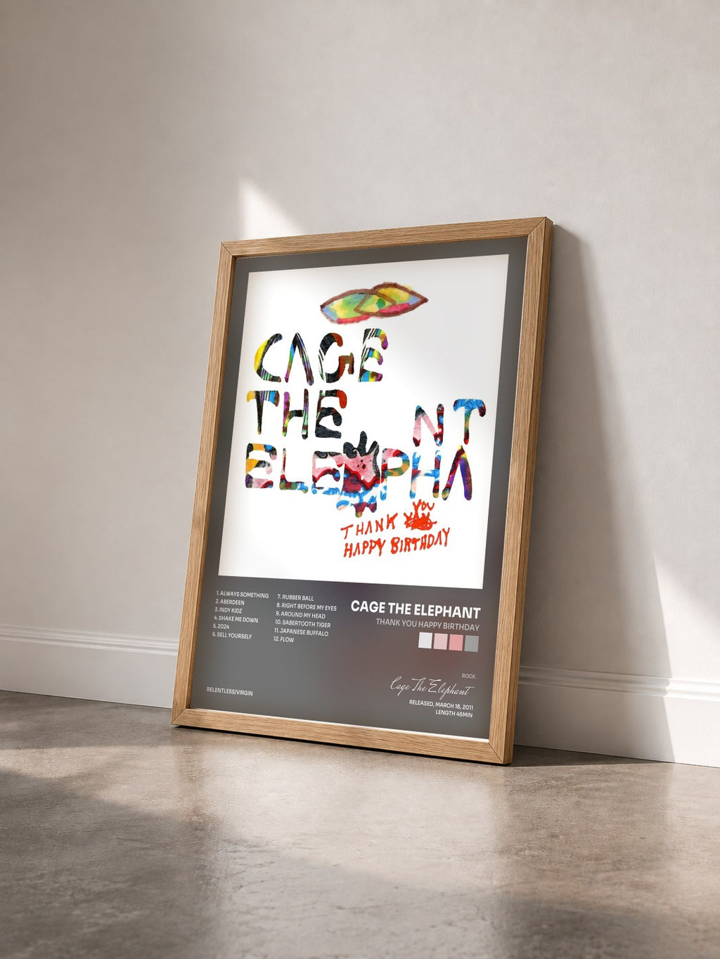 #bois Tableau de l'album Thank You Happy Birthday de Cage The Elephant vu de trois quarts, cadre en bois brut