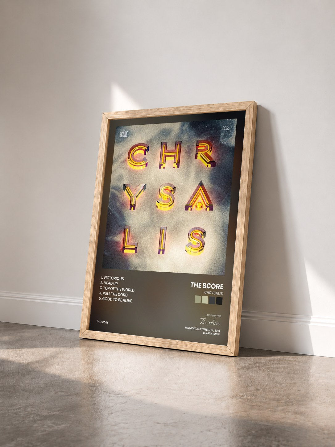 #bois Tableau de l'album Chrysalis de The Score vu de trois quarts, cadre en bois brut