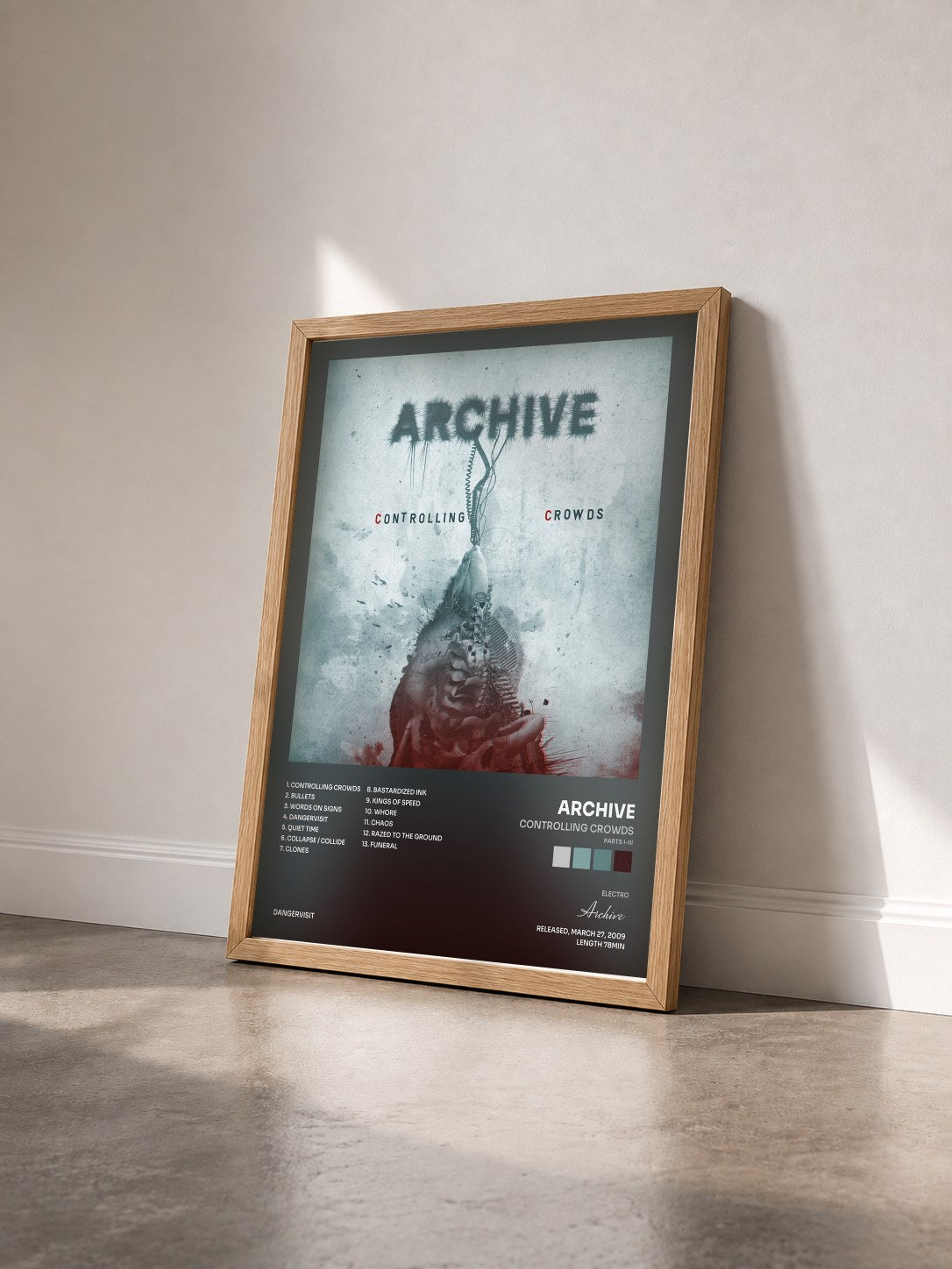 #bois Tableau de l'album Controlling Crowds (Parts I-III) de Archive vu de trois quarts, cadre en bois brut