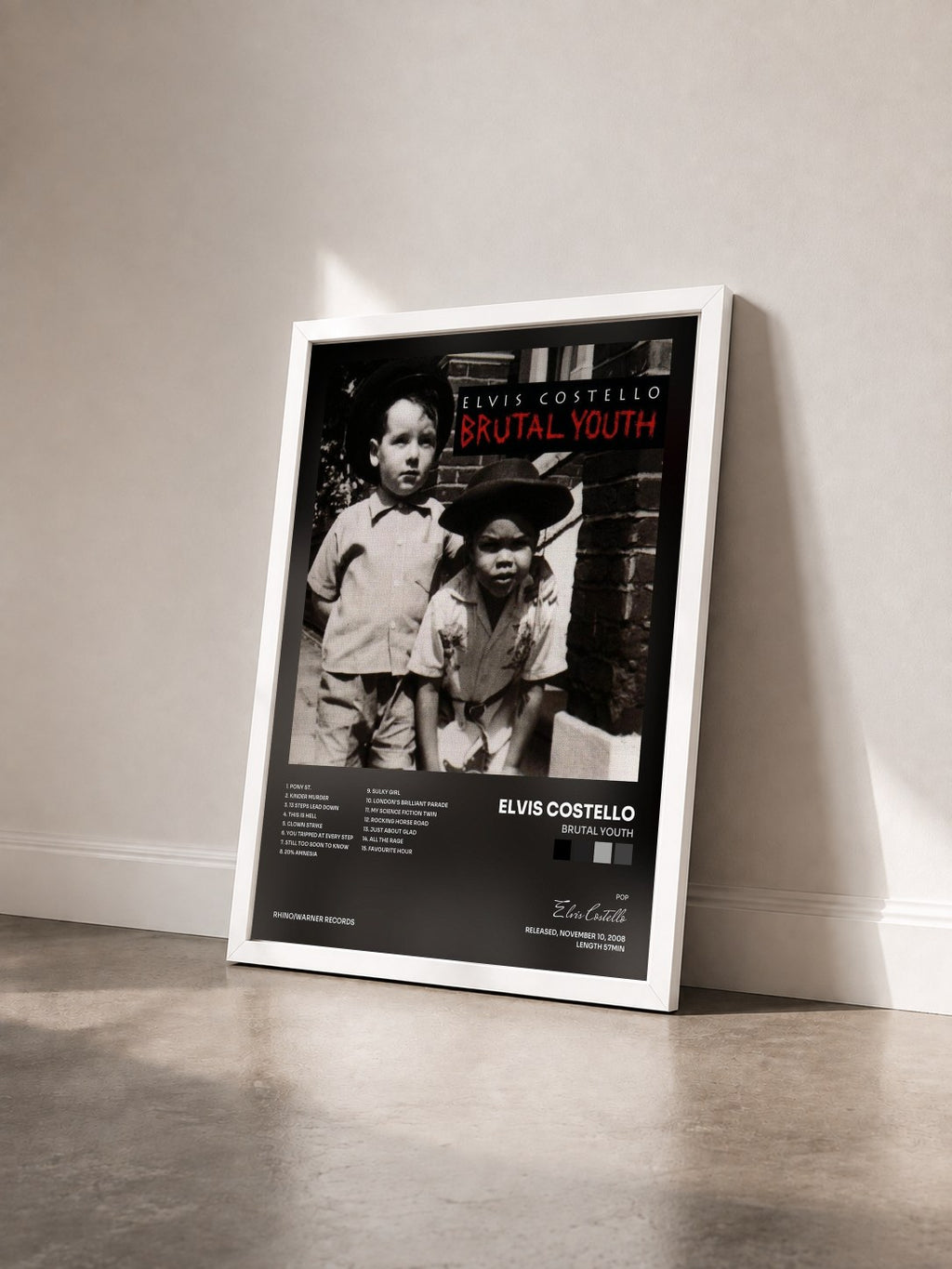 #blanc Tableau de l'album Brutal Youth de Elvis Costello vu de trois quarts, cadre blanc