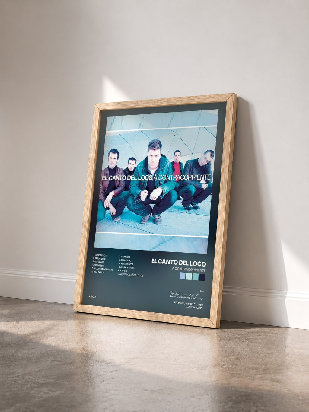 #bois Tableau de l'album A Contracorriente de El Canto del Loco vu de trois quarts, cadre en bois brut