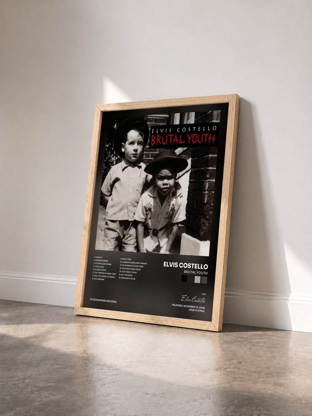 #bois Tableau de l'album Brutal Youth de Elvis Costello vu de trois quarts, cadre en bois brut