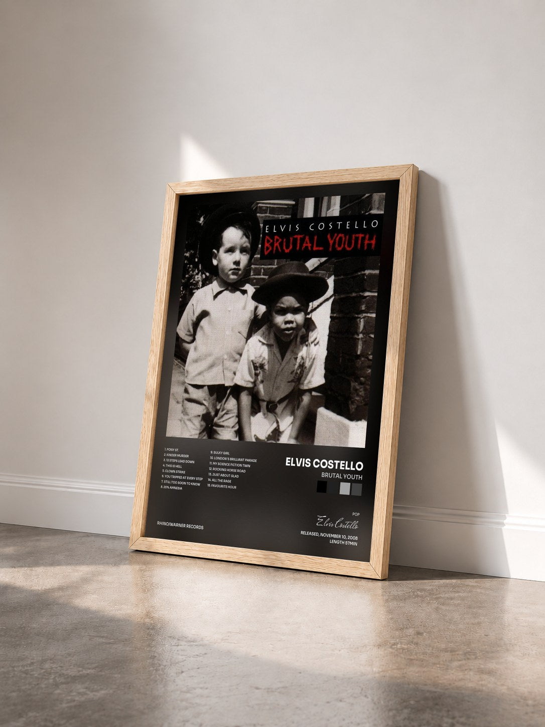 #bois Tableau de l'album Brutal Youth de Elvis Costello vu de trois quarts, cadre en bois brut