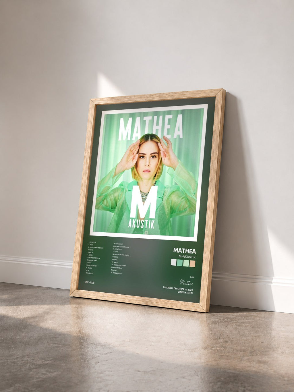 #bois Tableau de l'album M-Akustik de Mathea vu de trois quarts, cadre en bois brut