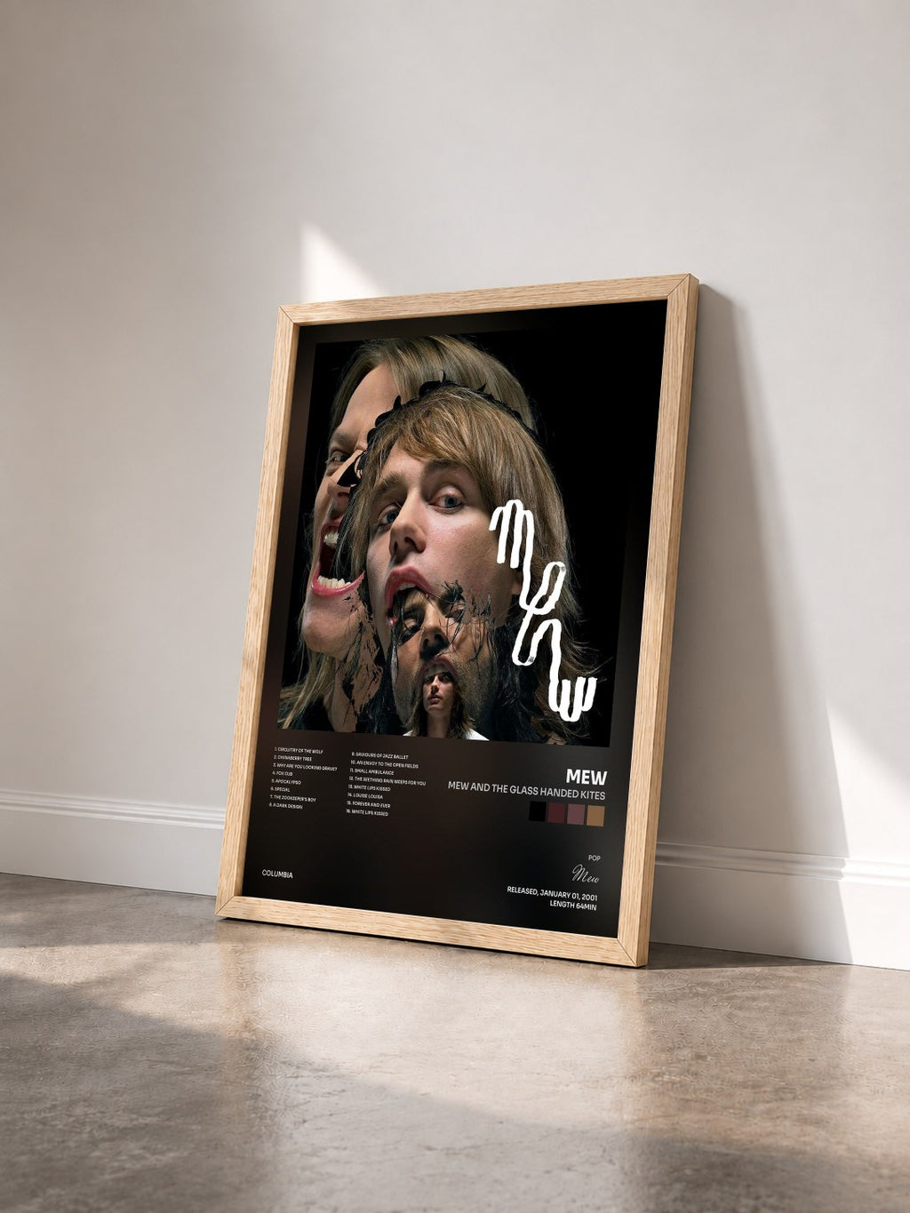 #bois Tableau de l'album Mew And The Glass Handed Kites de Mew vu de trois quarts, cadre en bois brut