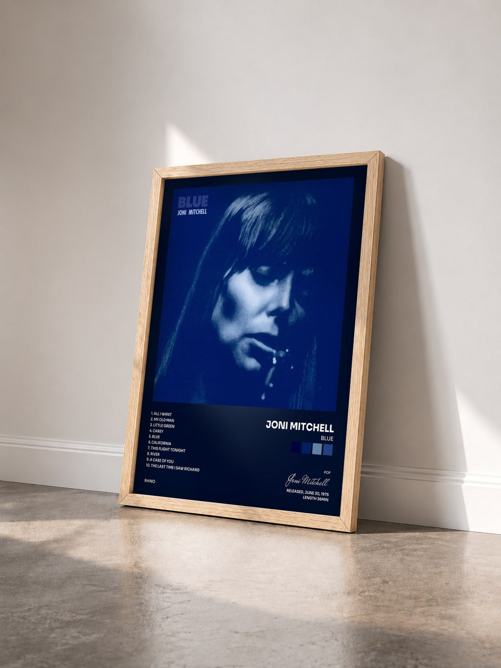 #bois Tableau de l'album Blue de Joni Mitchell vu de trois quarts, cadre en bois brut