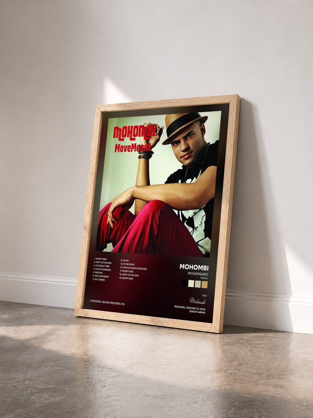 #bois Tableau de l'album MoveMeant (French) de Mohombi vu de trois quarts, cadre en bois brut