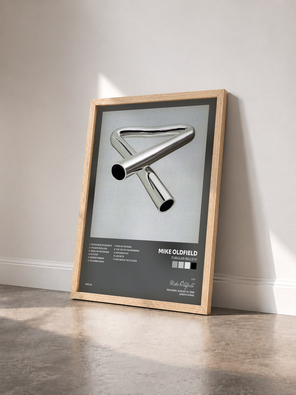 #bois Tableau de l'album Tubular Bells III de Mike Oldfield vu de trois quarts, cadre en bois brut