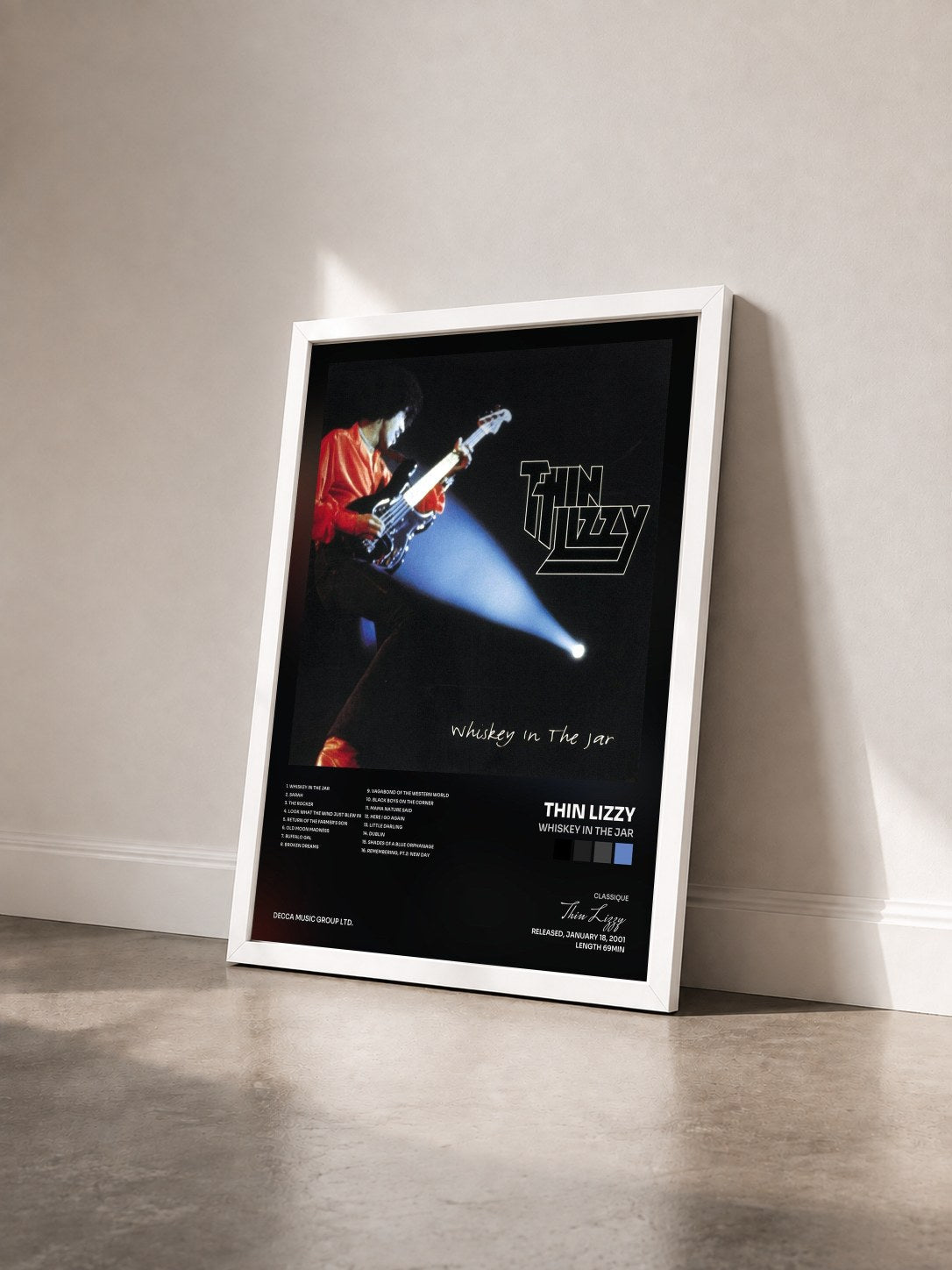 #blanc Tableau de l'album Whiskey In The Jar de Thin Lizzy vu de trois quarts, cadre blanc