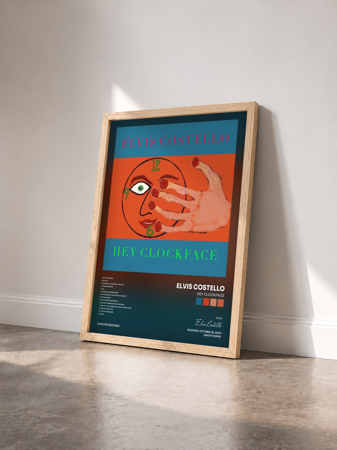 #bois Tableau de l'album Hey Clockface de Elvis Costello vu de trois quarts, cadre en bois brut