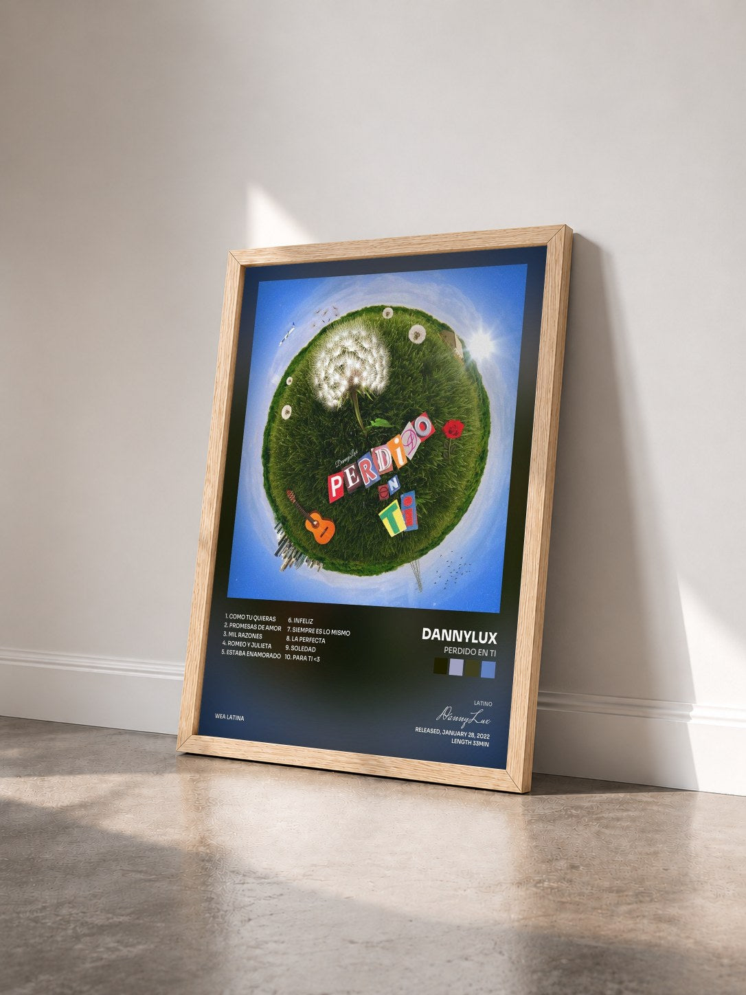 #bois Tableau de l'album Perdido En Ti de DannyLux vu de trois quarts, cadre en bois brut