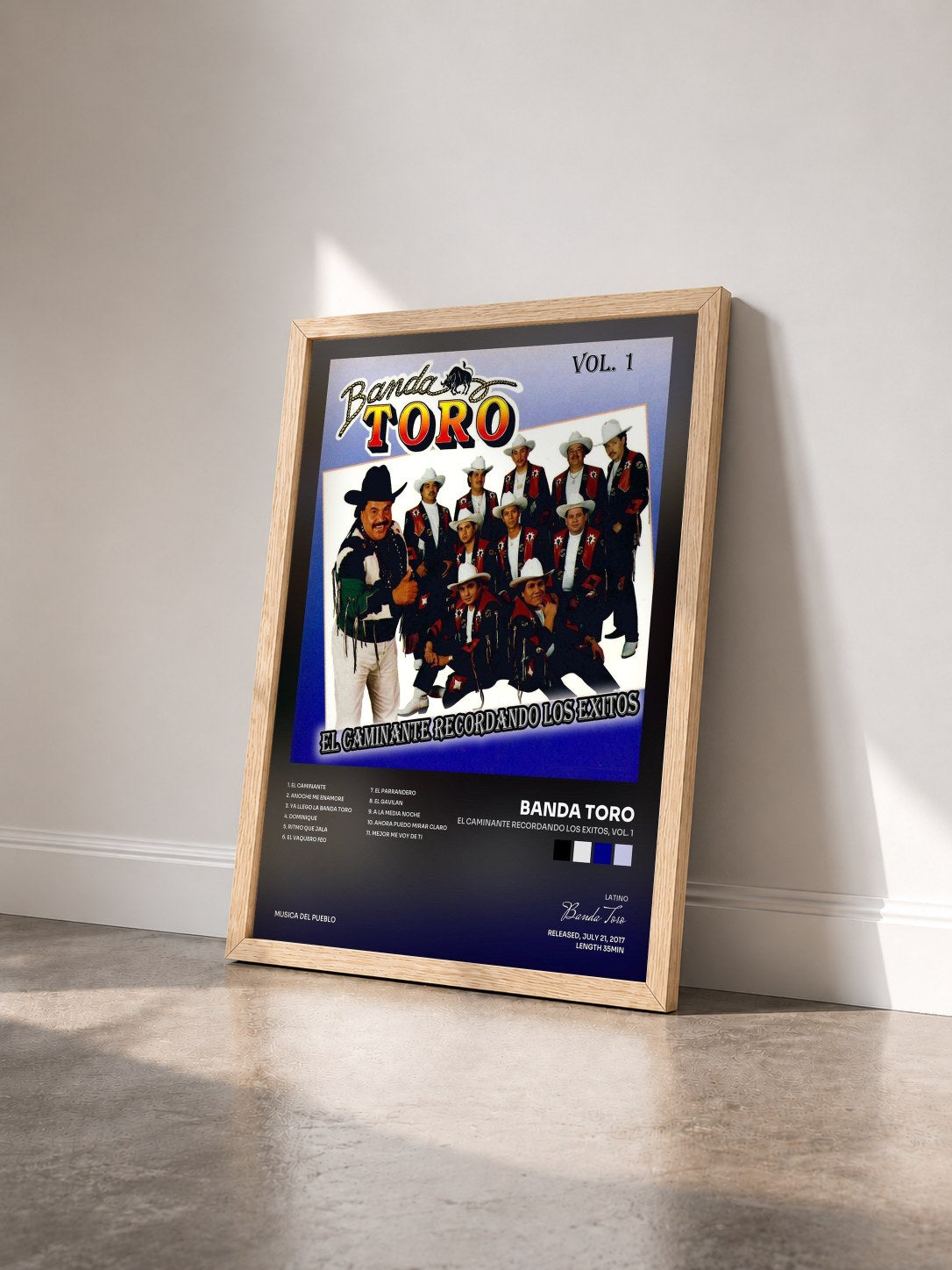 #bois Tableau de l'album El Caminante Recordando los Exitos, Vol. 1 de Banda Toro vu de trois quarts, cadre en bois brut