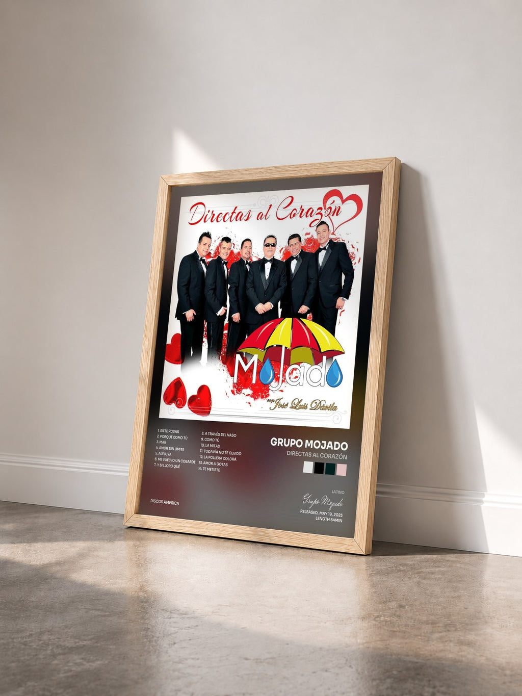 #bois Tableau de l'album Directas al Corazón de Grupo Mojado vu de trois quarts, cadre en bois brut