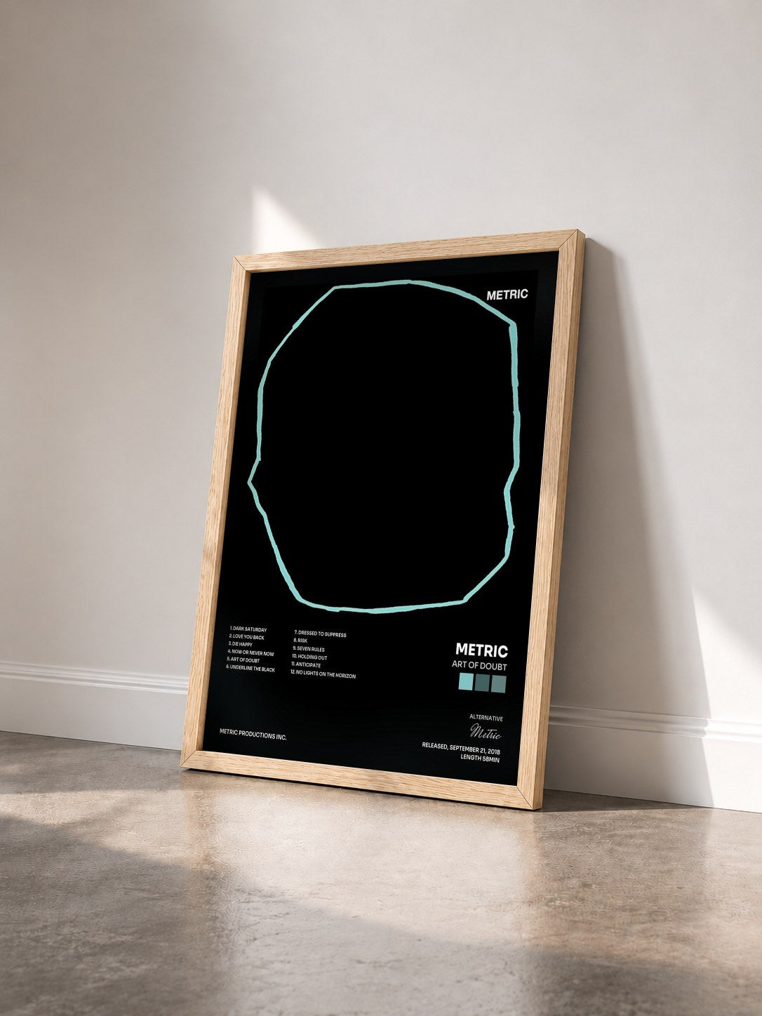 #bois Tableau de l'album Art of Doubt de Metric vu de trois quarts, cadre en bois brut