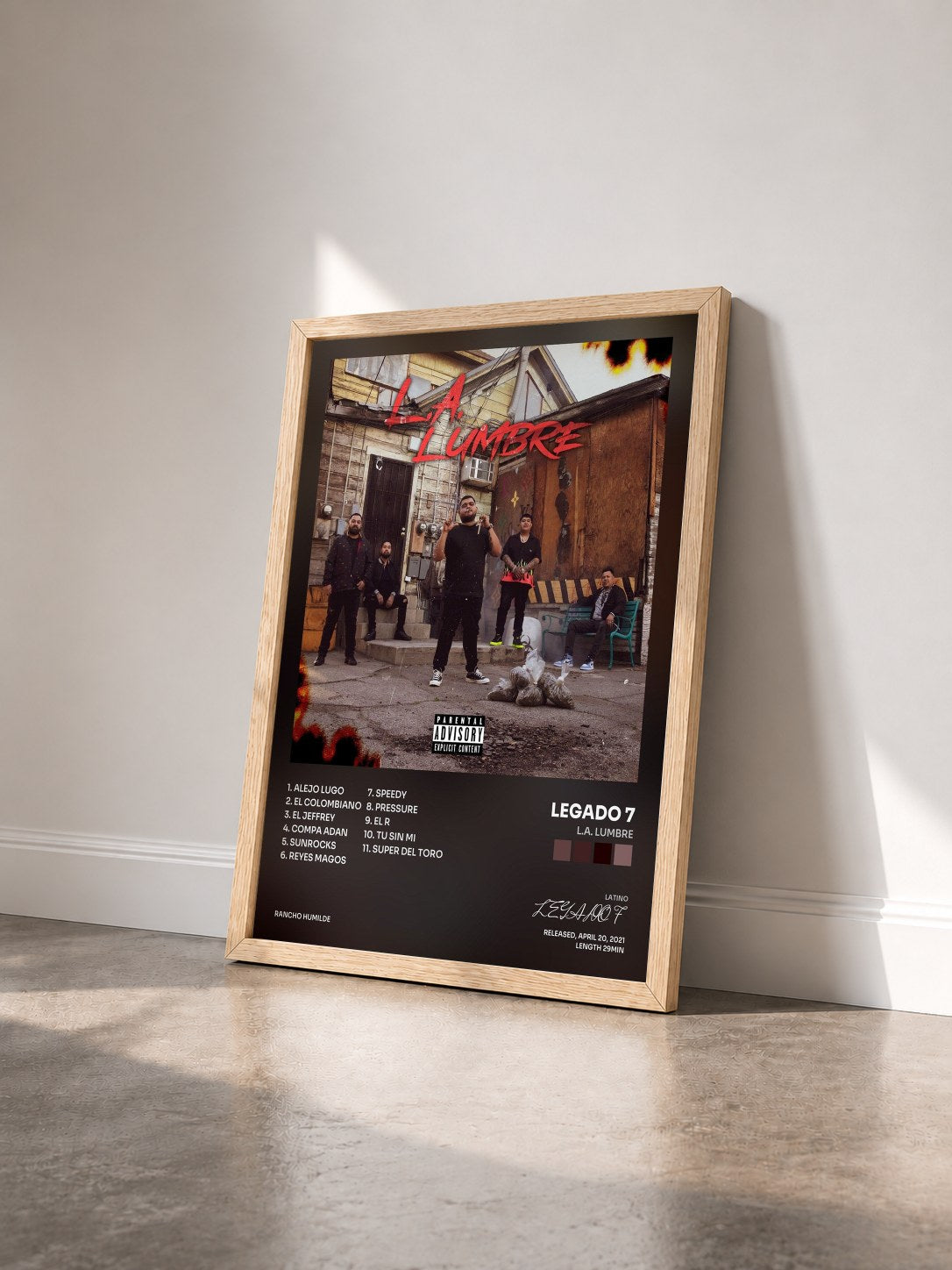 #bois Tableau de l'album L.A. Lumbre de LEGADO 7 vu de trois quarts, cadre en bois brut