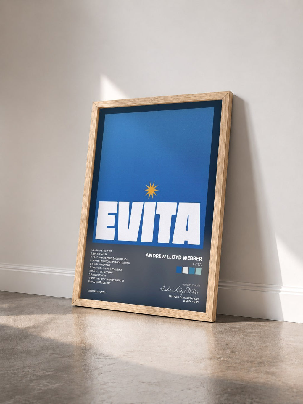 #bois Tableau de l'album Evita de Andrew Lloyd Webber vu de trois quarts, cadre en bois brut