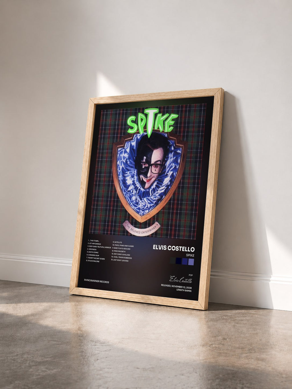 #bois Tableau de l'album Spike de Elvis Costello vu de trois quarts, cadre en bois brut