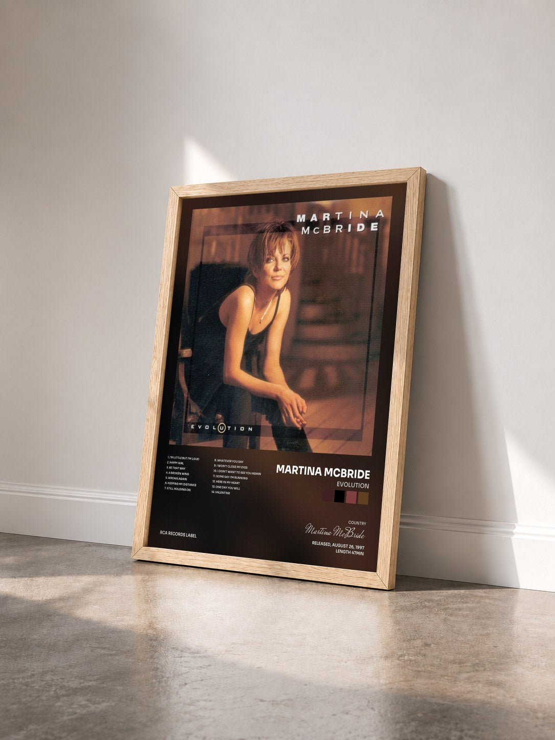 #bois Tableau de l'album Evolution de Martina McBride vu de trois quarts, cadre en bois brut