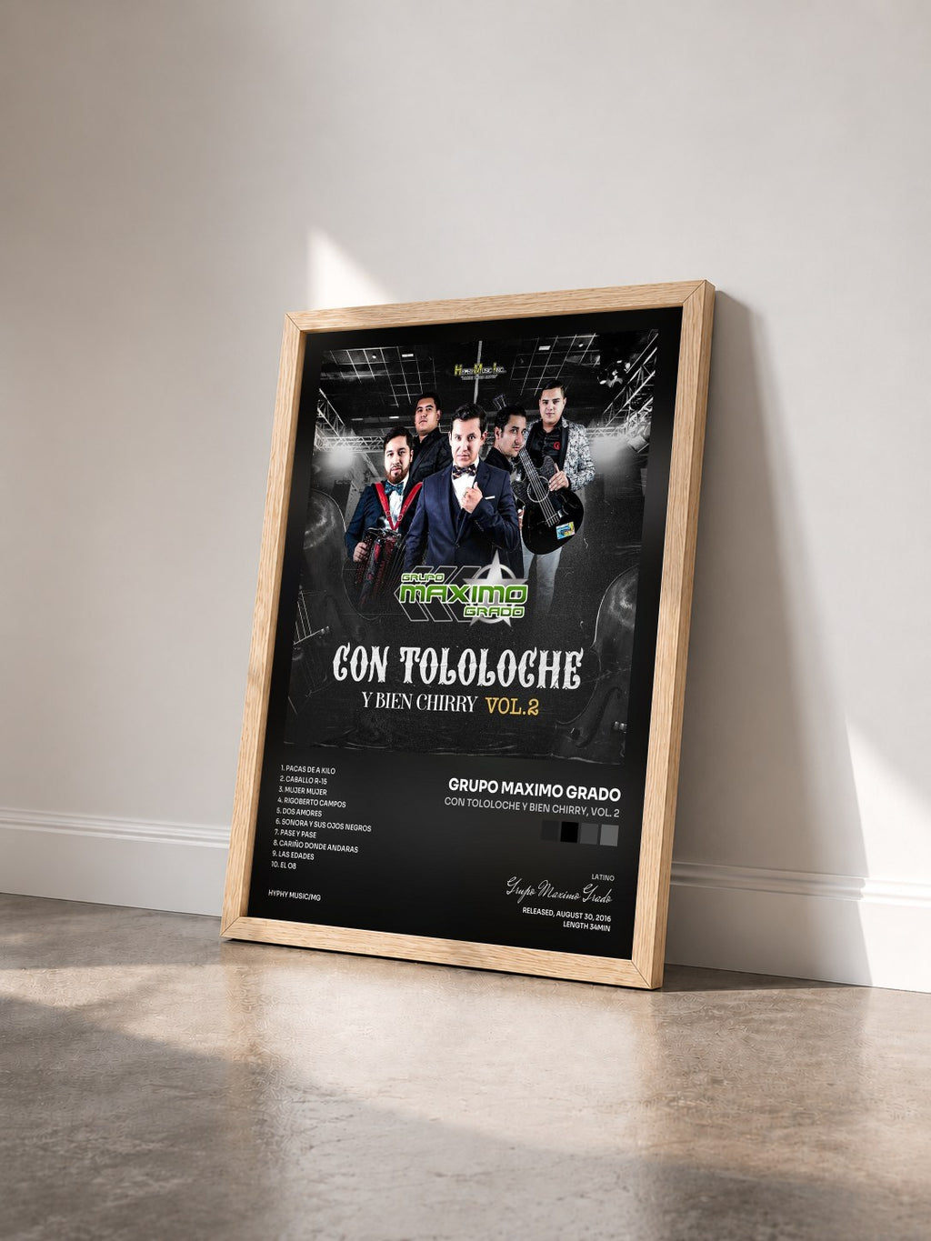 #bois Tableau de l'album Con Tololoche y Bien Chirry, Vol. 2 de Grupo Maximo Grado vu de trois quarts, cadre en bois brut