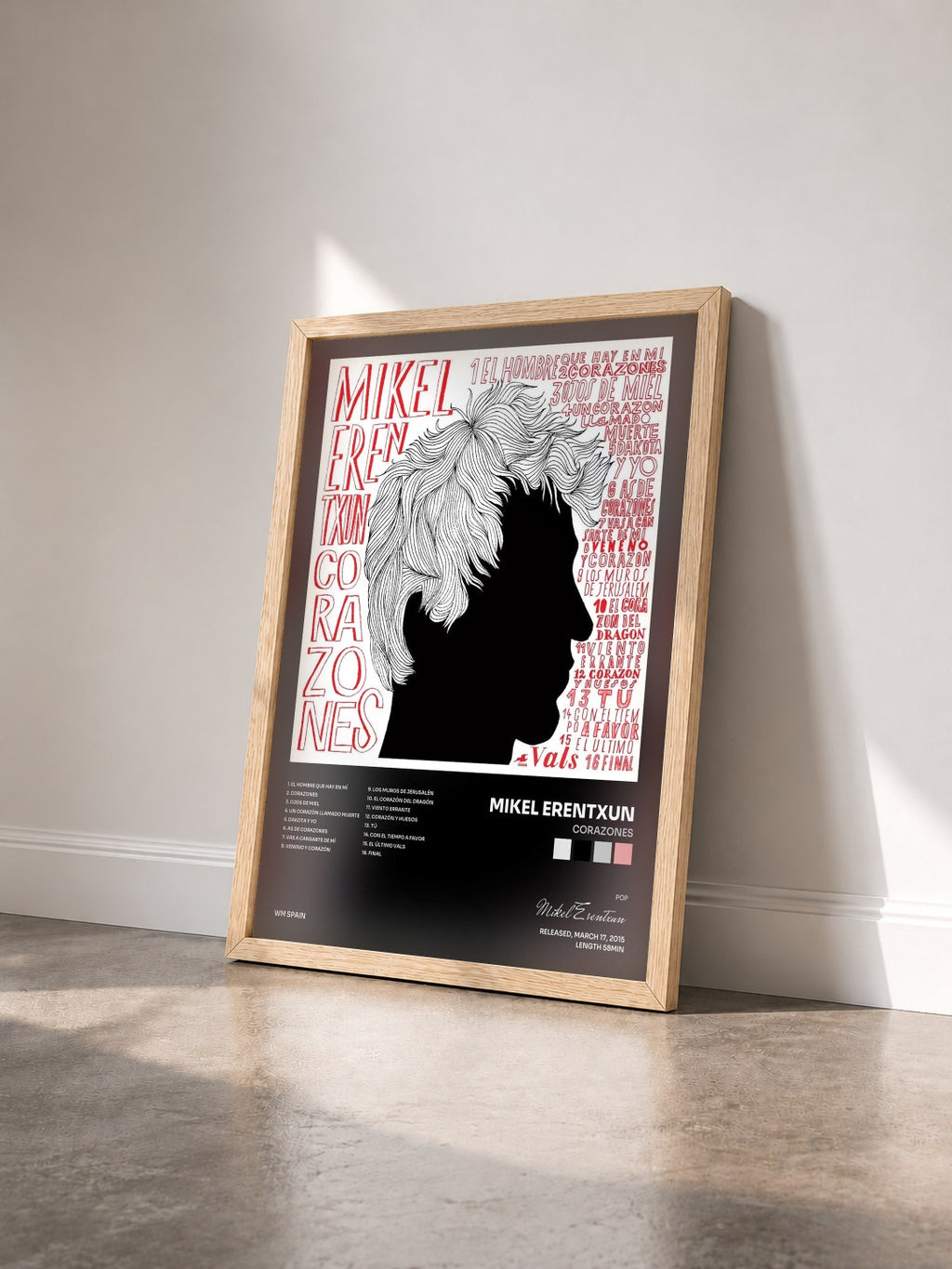 #bois Tableau de l'album Corazones de Mikel Erentxun vu de trois quarts, cadre en bois brut