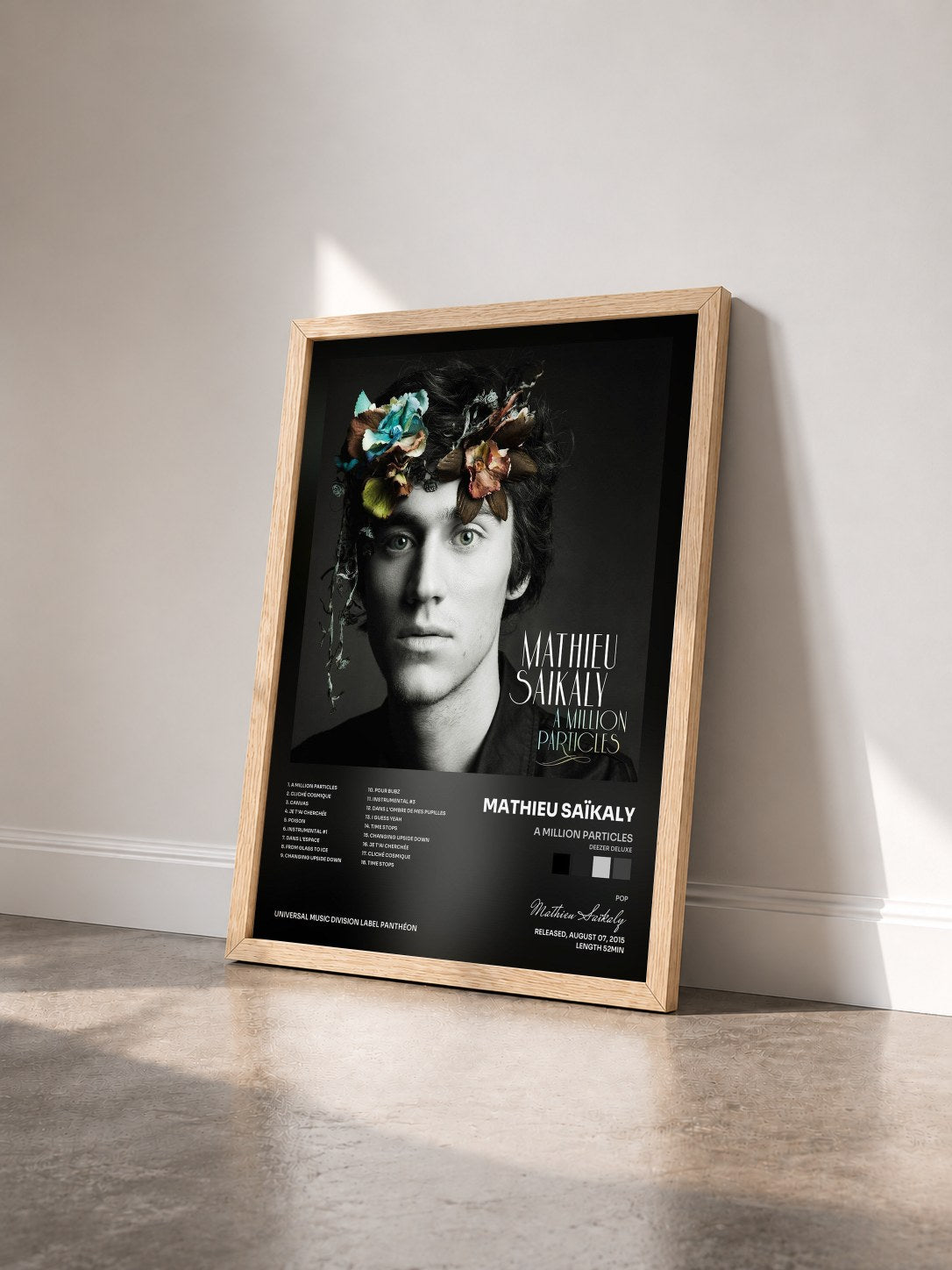 #bois Tableau de l'album A Million Particles (Deezer Deluxe) de Mathieu Saïkaly vu de trois quarts, cadre en bois brut