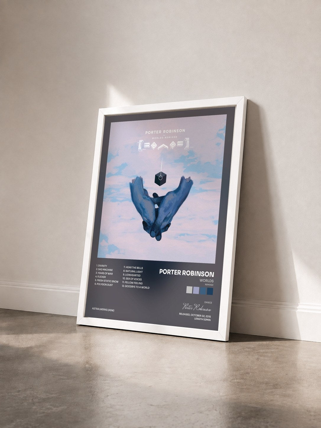 #blanc Tableau de l'album Worlds (Remixed) de Porter Robinson vu de trois quarts, cadre blanc