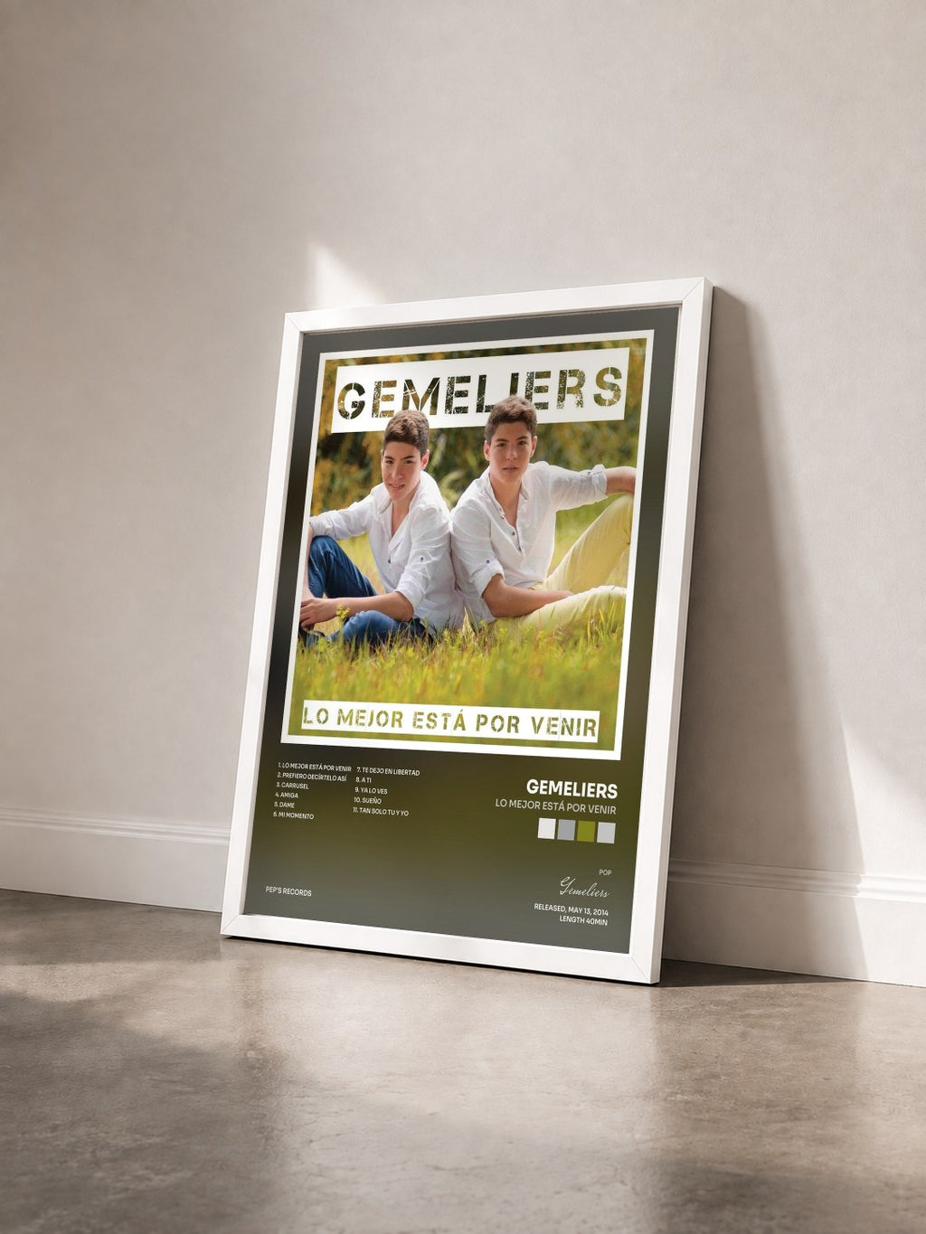 #blanc Tableau de l'album Lo Mejor Está por Venir de Gemeliers vu de trois quarts, cadre blanc