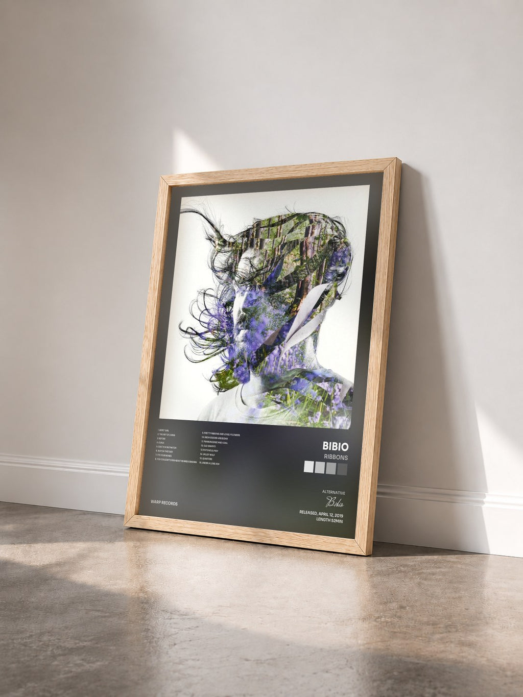 #bois Tableau de l'album Ribbons de Bibio vu de trois quarts, cadre en bois brut