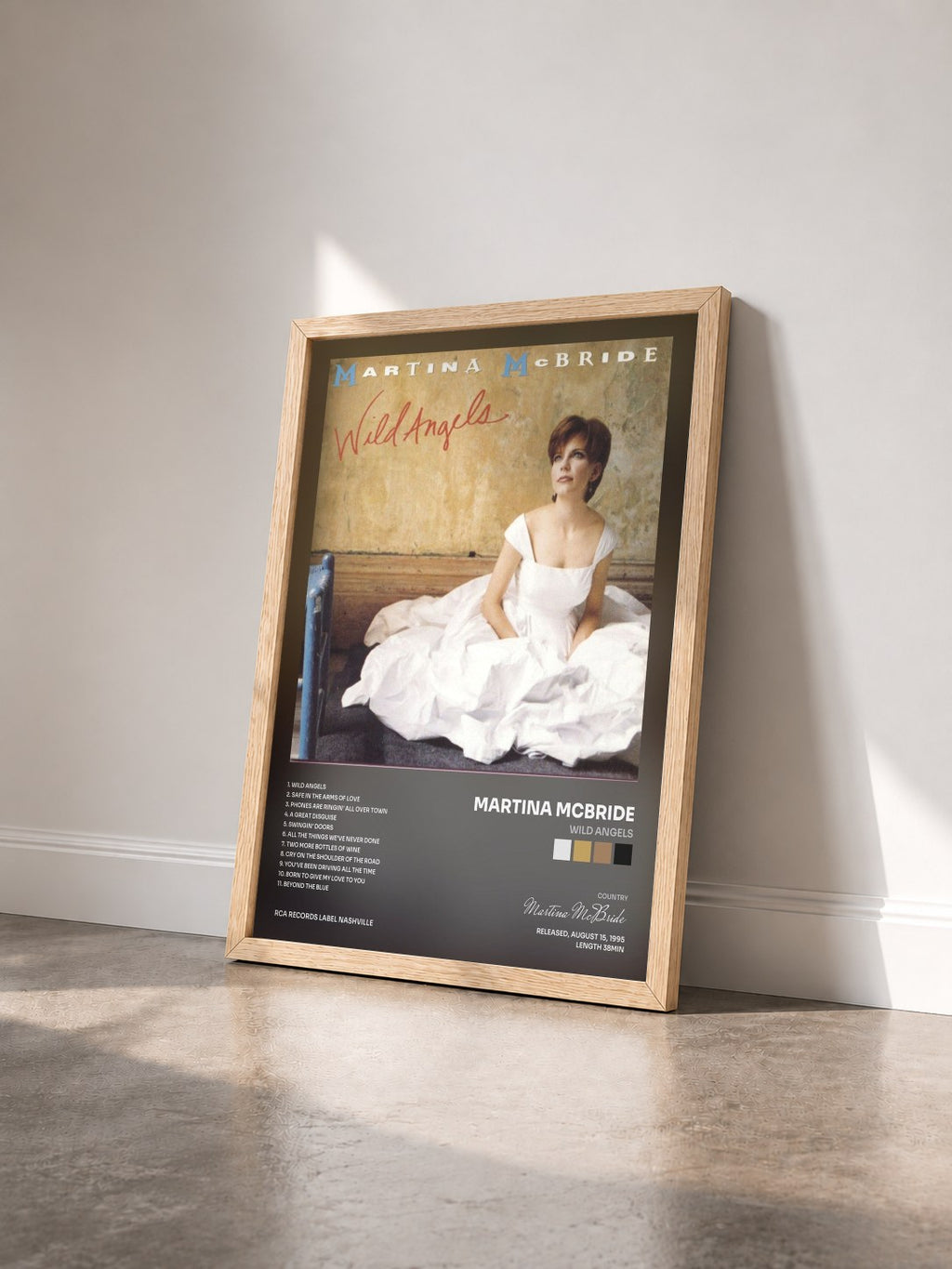 #bois Tableau de l'album Wild Angels de Martina McBride vu de trois quarts, cadre en bois brut