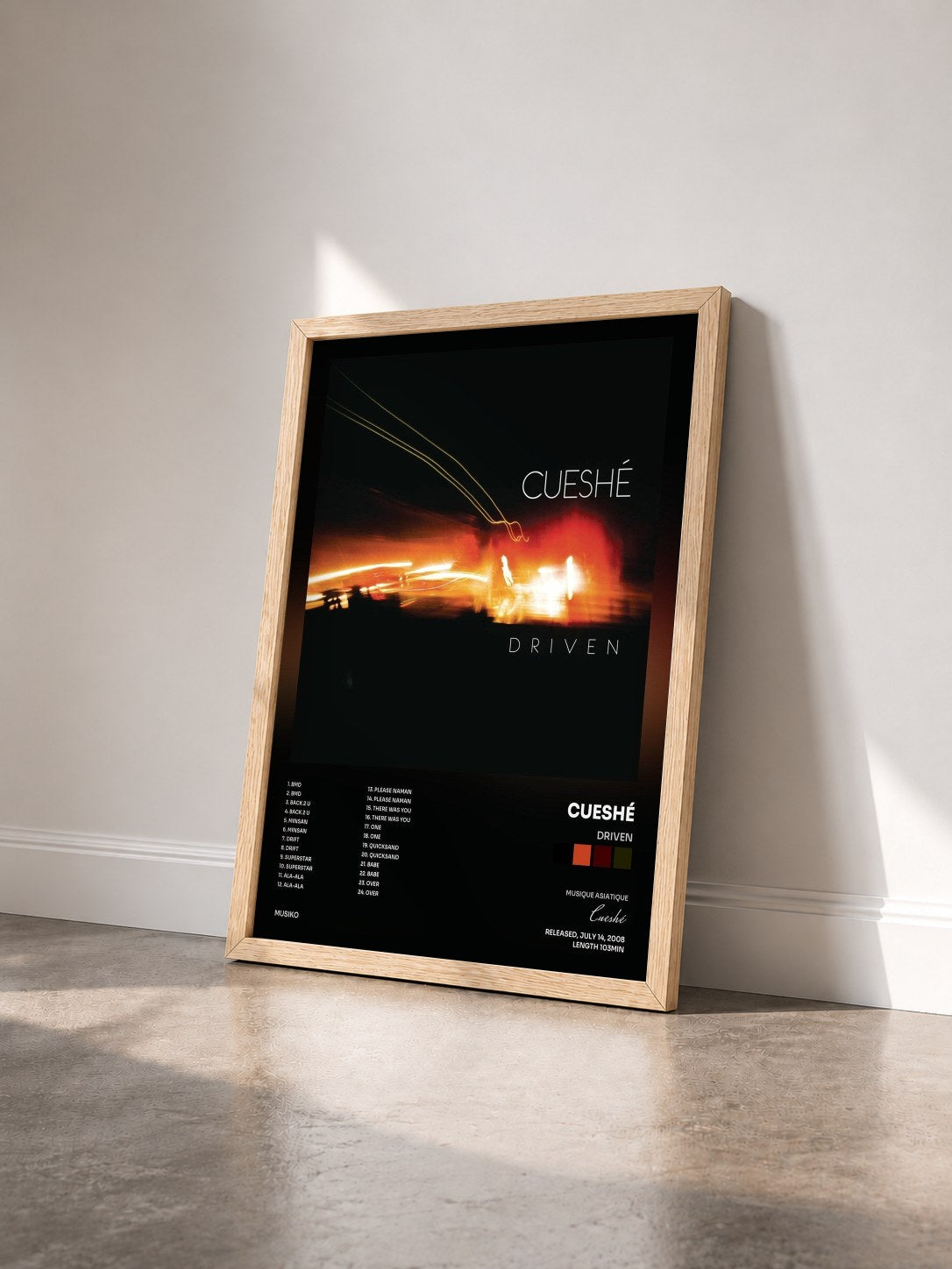 #bois Tableau de l'album Driven de Cueshé vu de trois quarts, cadre en bois brut