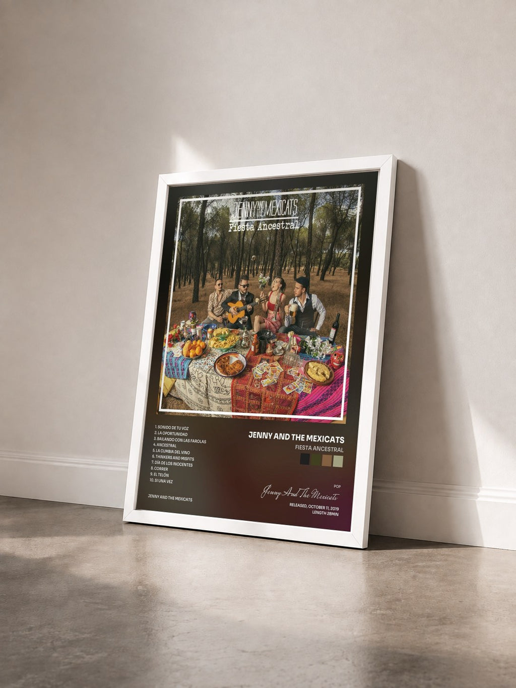 #blanc Tableau de l'album Fiesta Ancestral de Jenny And The Mexicats vu de trois quarts, cadre blanc
