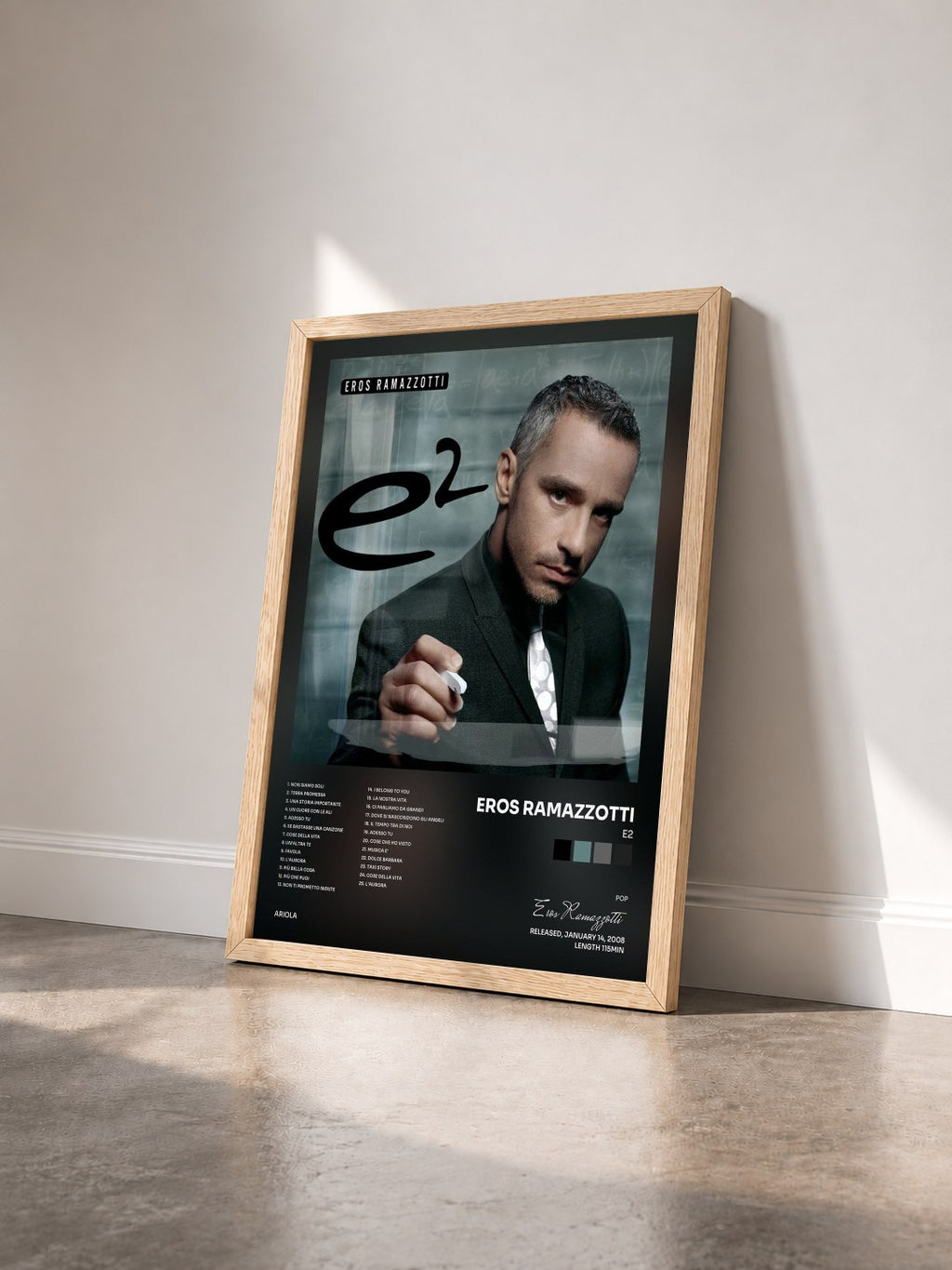 #bois Tableau de l'album E2 de Eros Ramazzotti vu de trois quarts, cadre en bois brut