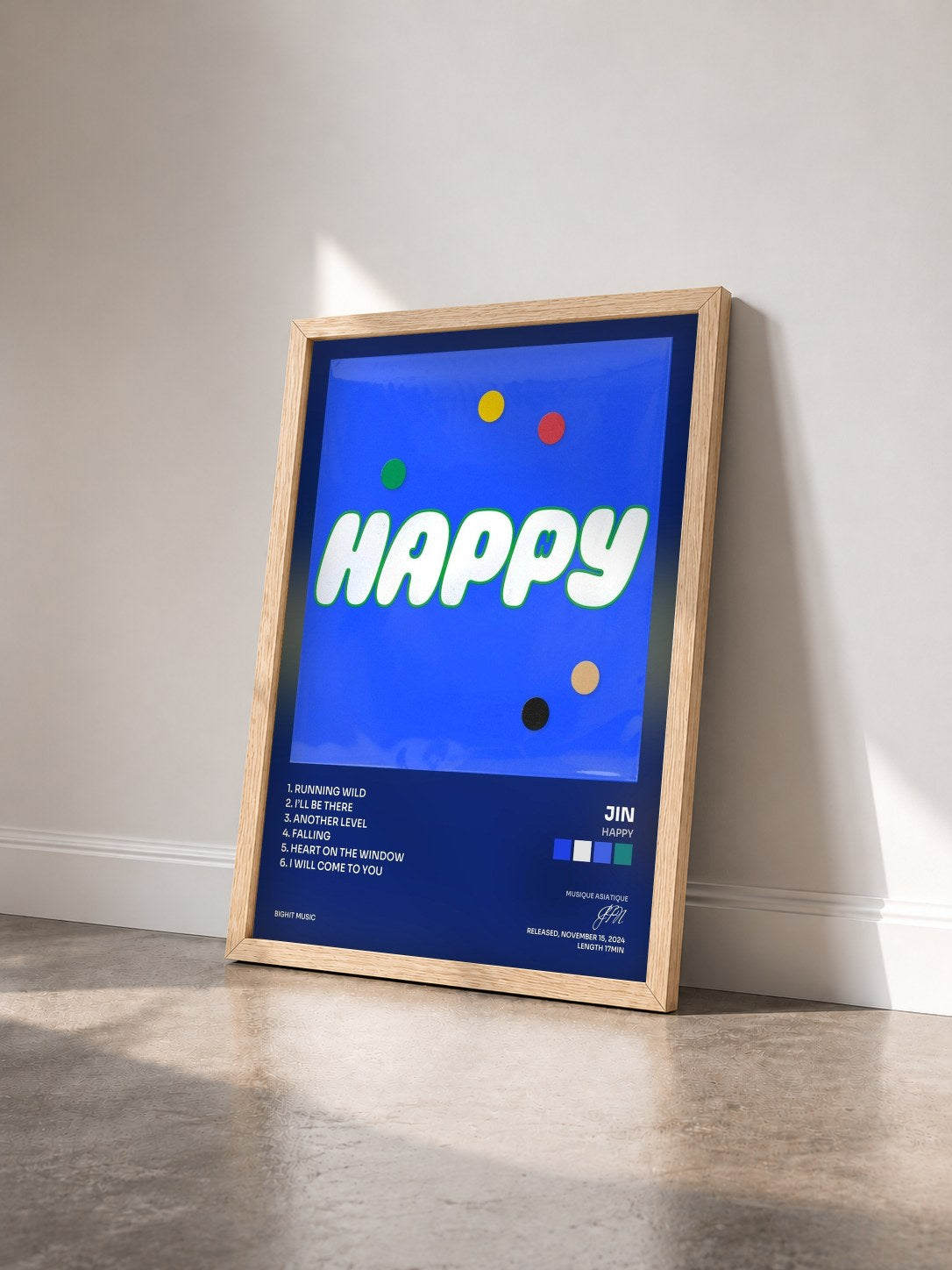 #bois Tableau de l'album Happy de JIN vu de trois quarts, cadre en bois brut