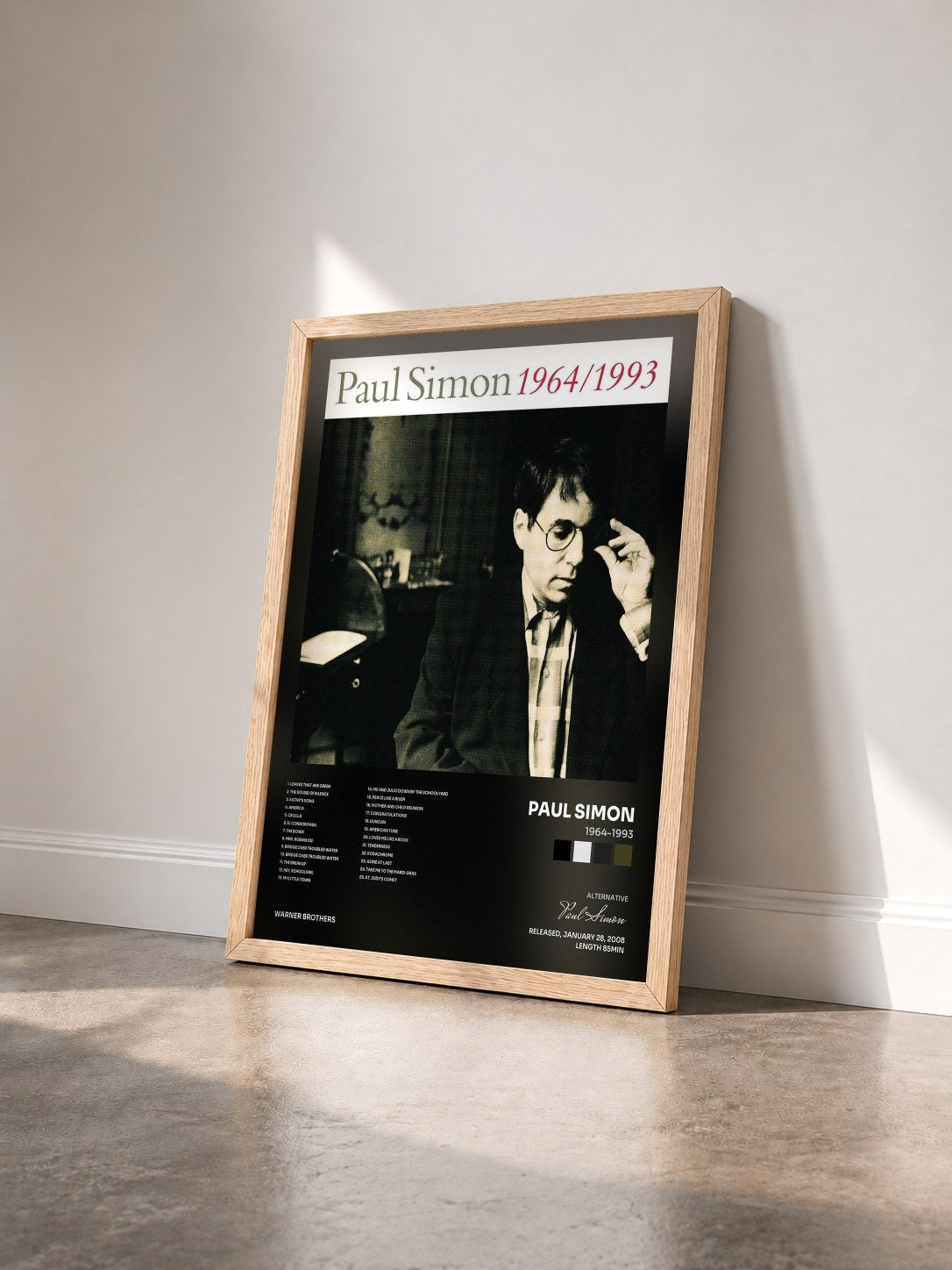 #bois Tableau de l'album 1964-1993 de Paul Simon vu de trois quarts, cadre en bois brut
