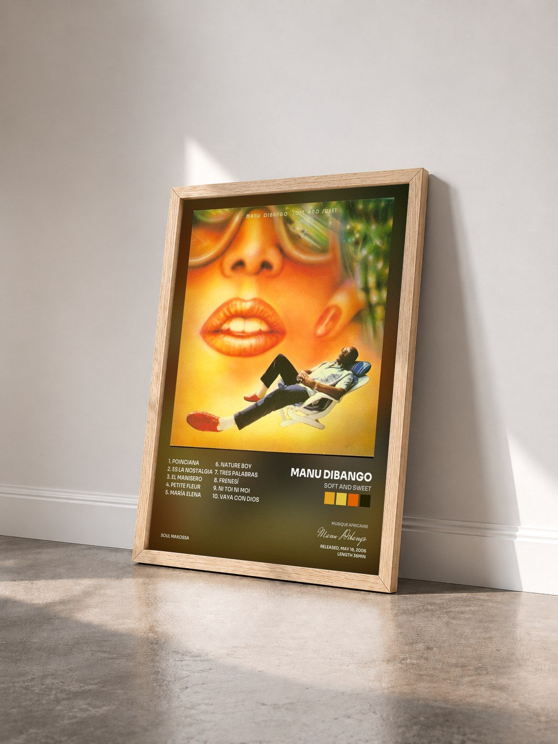#bois Tableau de l'album Soft And Sweet de Manu Dibango vu de trois quarts, cadre en bois brut