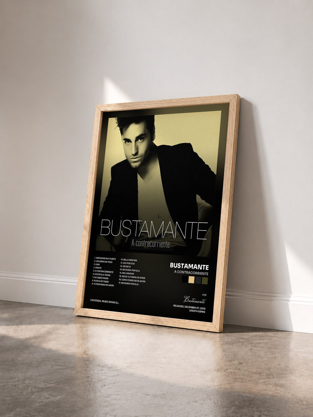#bois Tableau de l'album A Contracorriente de Bustamante vu de trois quarts, cadre en bois brut