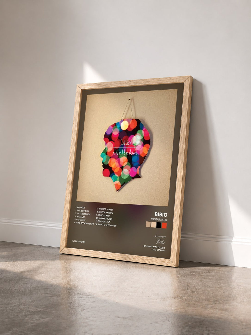 #bois Tableau de l'album Mind Bokeh de Bibio vu de trois quarts, cadre en bois brut