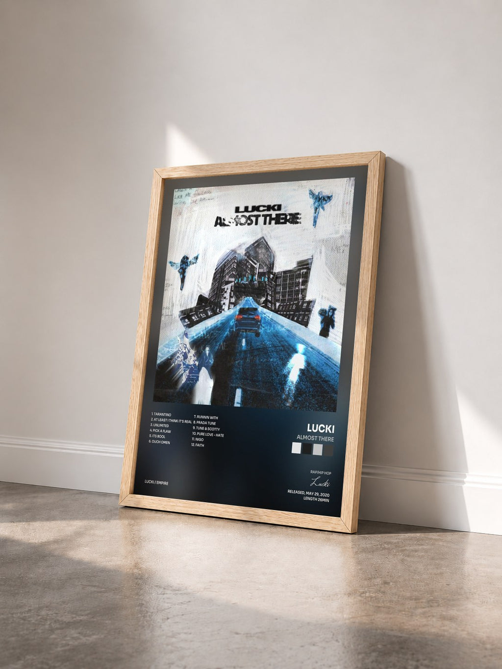 #bois Tableau de l'album Almost There de Lucki vu de trois quarts, cadre en bois brut