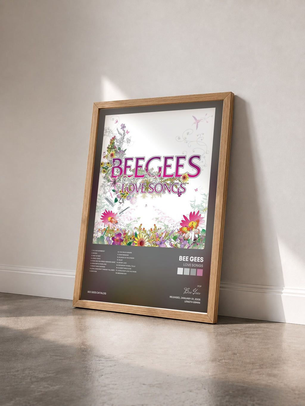 #bois Tableau de l'album Love Songs de Bee Gees vu de trois quarts, cadre en bois brut