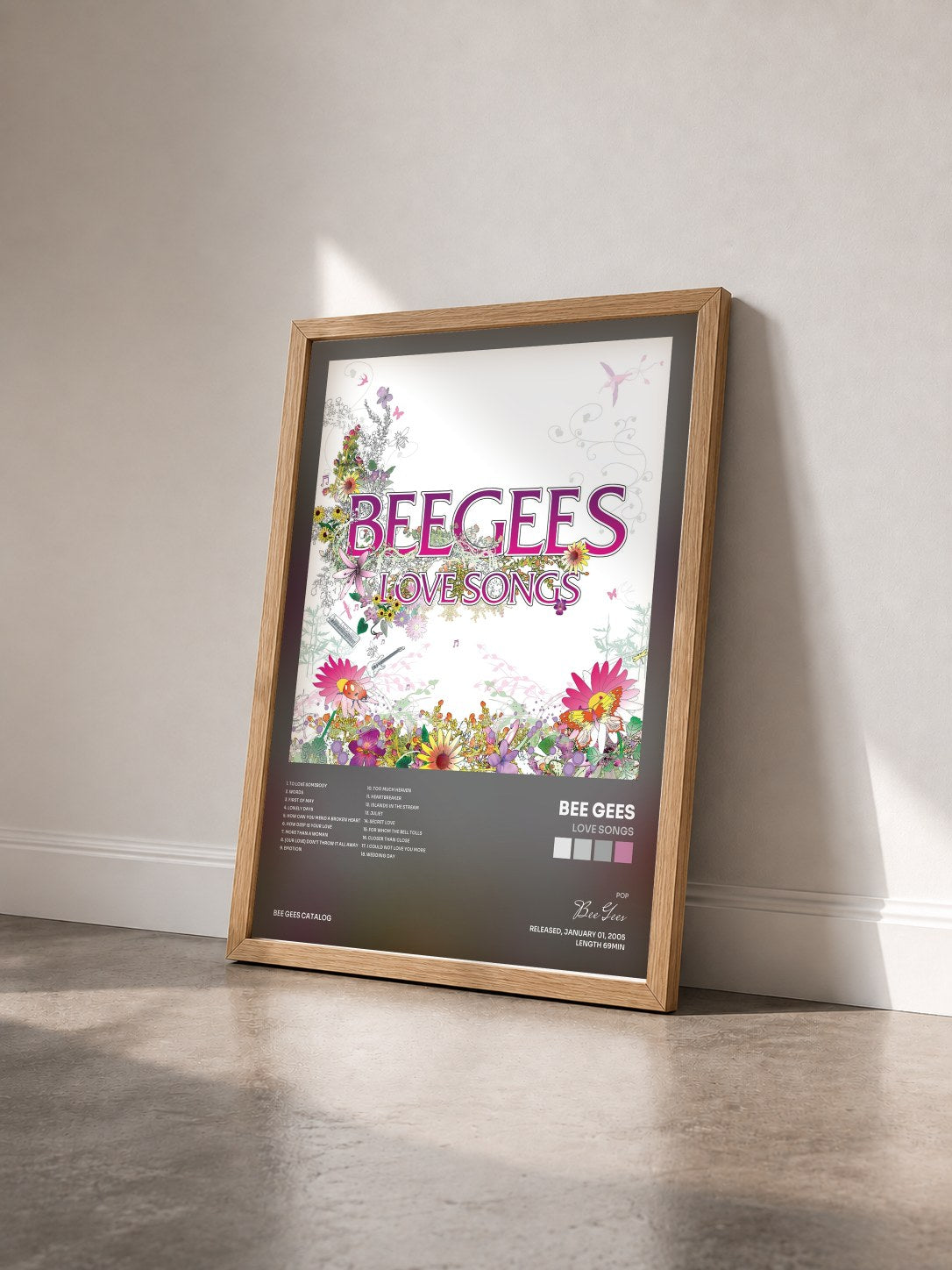 #bois Tableau de l'album Love Songs de Bee Gees vu de trois quarts, cadre en bois brut