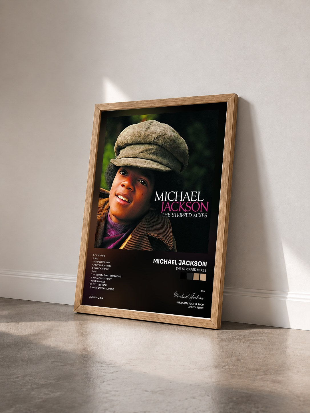 #bois Tableau de l'album The Stripped Mixes de Michael Jackson vu de trois quarts, cadre en bois brut
