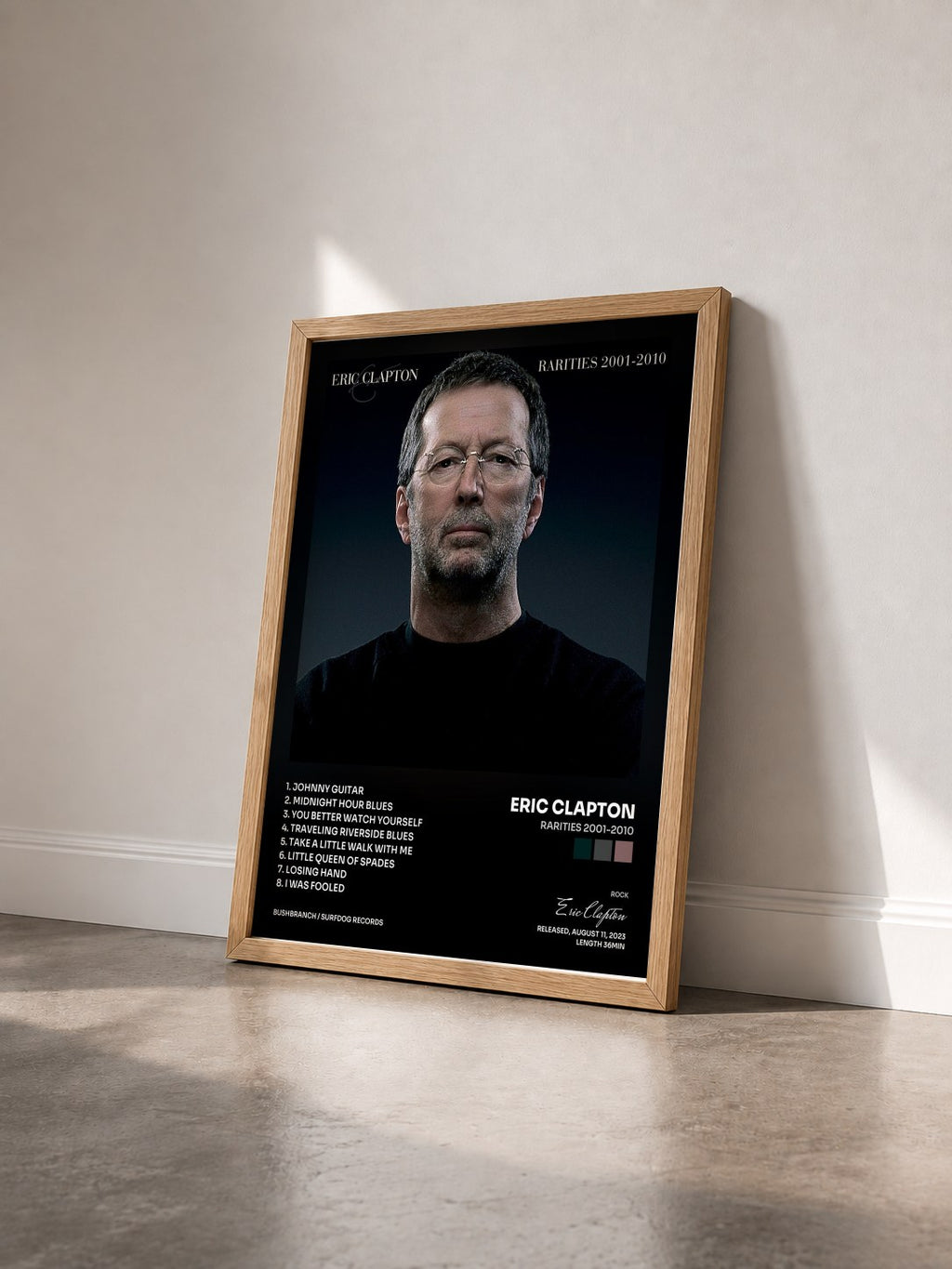 #bois Tableau de l'album Rarities 2001-2010 de Eric Clapton vu de trois quarts, cadre en bois brut