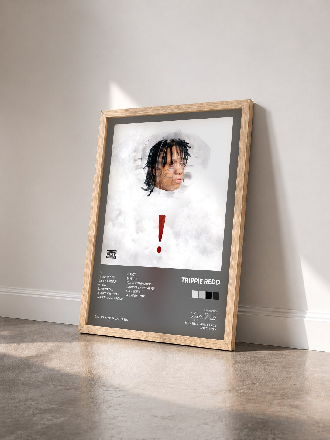 #bois Tableau de l'album ! de Trippie Redd vu de trois quarts, cadre en bois brut
