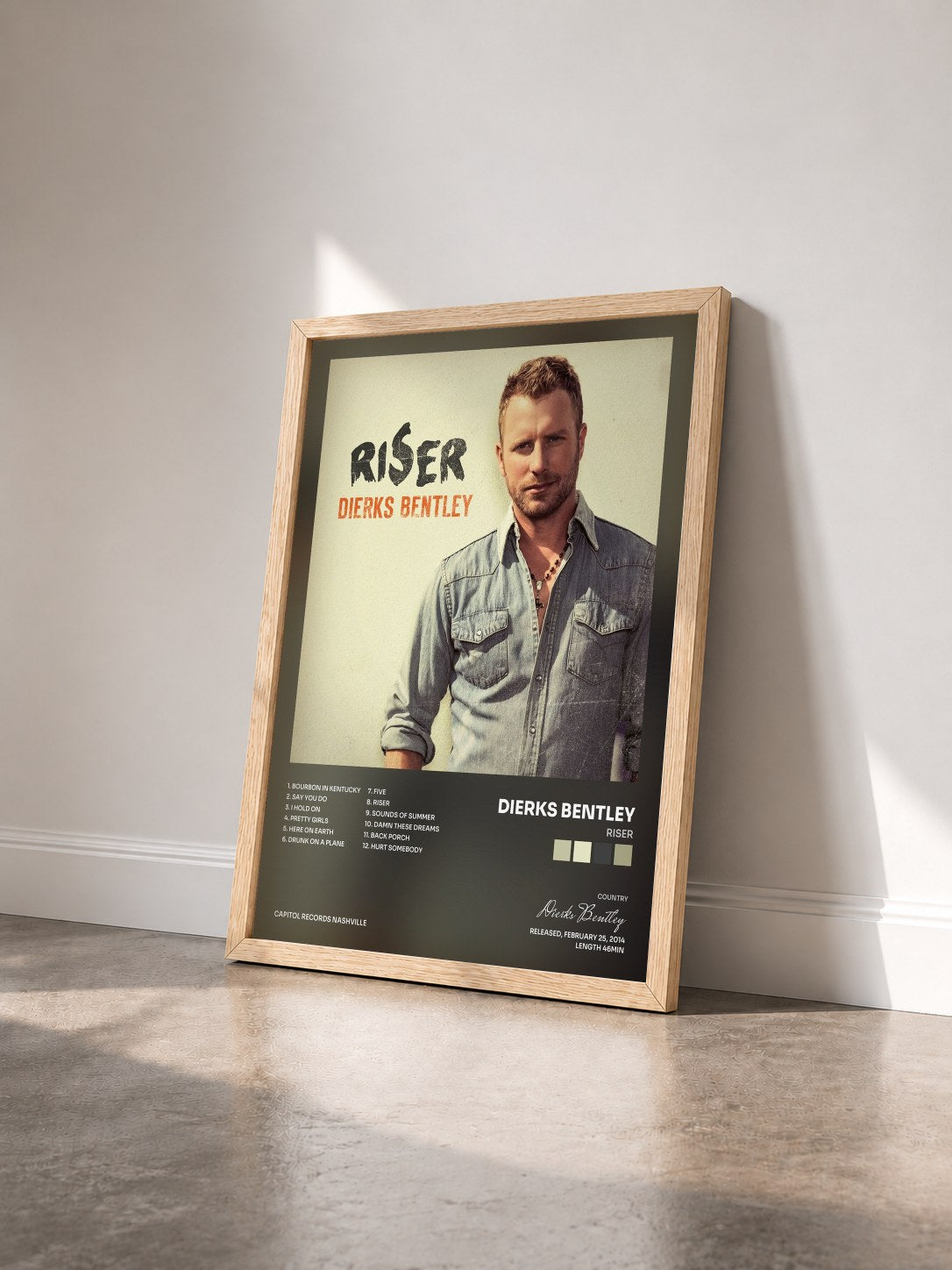 #bois Tableau de l'album RISER de Dierks Bentley vu de trois quarts, cadre en bois brut